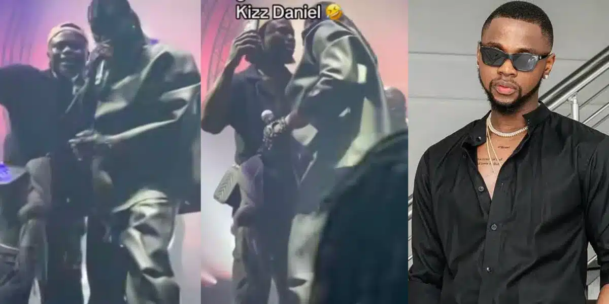 Male fan excited as Kizz Daniel picks him while performing on stage