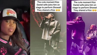 Romantic moment as Kizz Daniel's wife, Mrs. Anidugbe joins him on stage, shares kiss as he performs hit song
