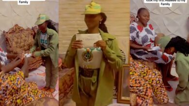 Youth corps member presents first NYSC allowance of ₦33,000 to her parents, salutes them