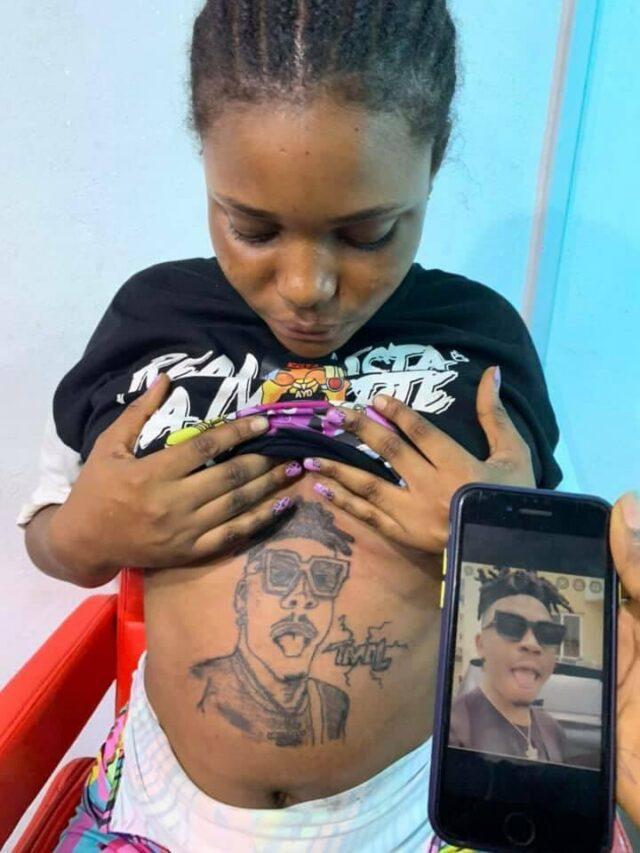 Lady tattoos on baby bump