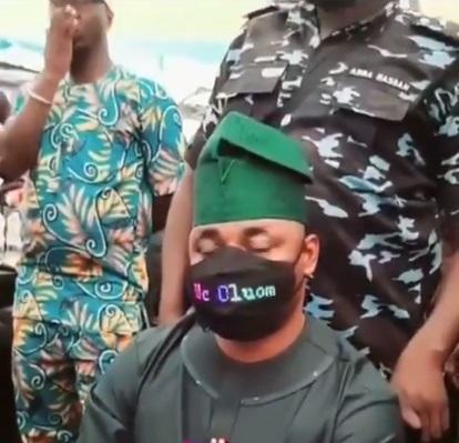 MC Oluomo rocks electronic nose mask with LED display of his name (Video)