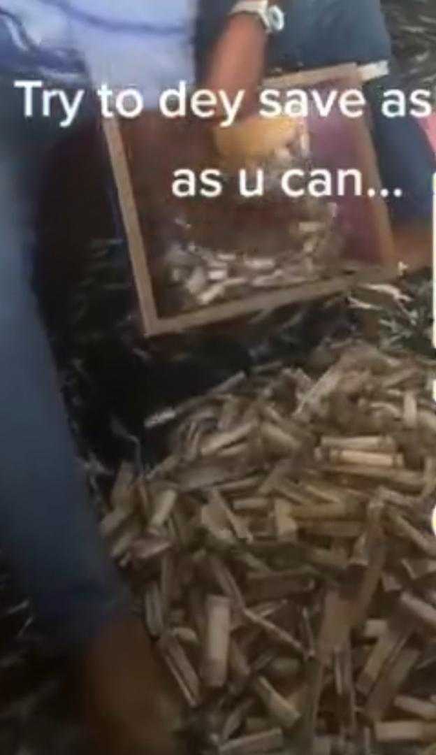 "Try to dey save" - Man says as he shows off amount in his piggy bank (Video)