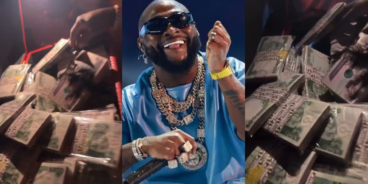 "The GOAT" - Davido shows off a big suitcase filled with millions of naira at a Lagos nightclub