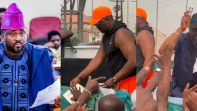 “People dey hungry una dey share perfume” — Netizens rage as Desmond Elliot shares perfume on the streets of Lagos