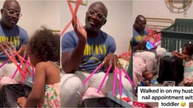 "This is so cute" - Netizens react as father sits comfortably as daughter fixes artificial nails for him