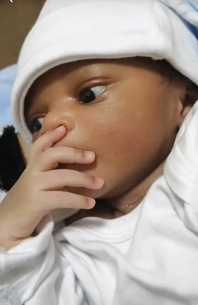“He paid for another country only to see Nigeria” — Reactions as new born is captured thinking 