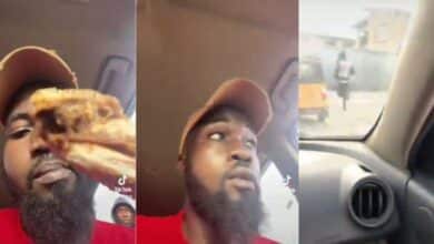 Man in shock as the chicken he was eating is snatched from his hand in Lagos traffic