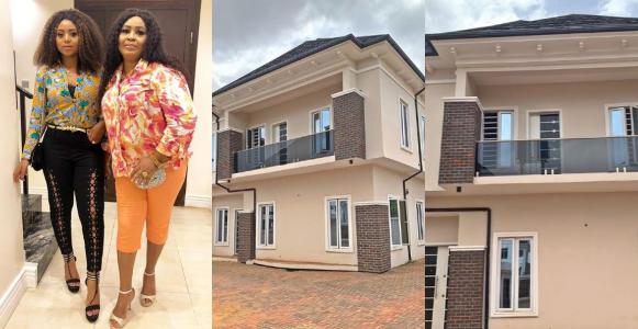 Image result for Actress Regina Daniels gifts mother a house