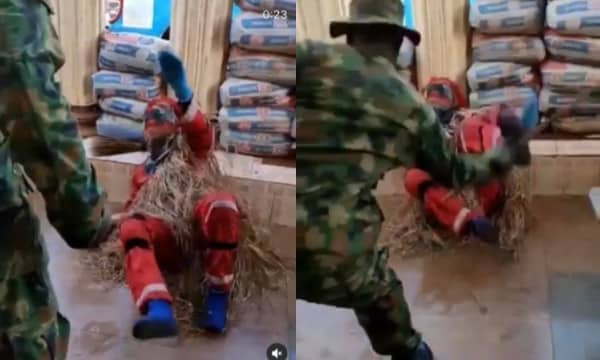 Masquerade begs for mercy while being flogged by a soldier (video)