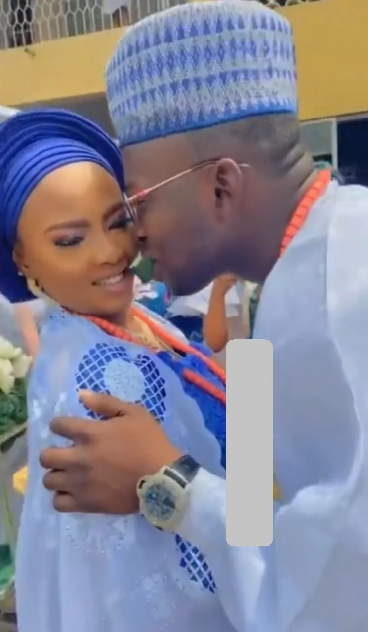 "This one don marry wrong wife" - Reactions trail wedding of lady who expressed discomfort at exchanging cake mouth-to-mouth with husband (Video)