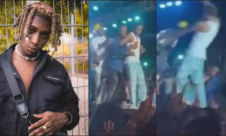 Bella Shmurda fumes after fan pushes him off stage (Video)