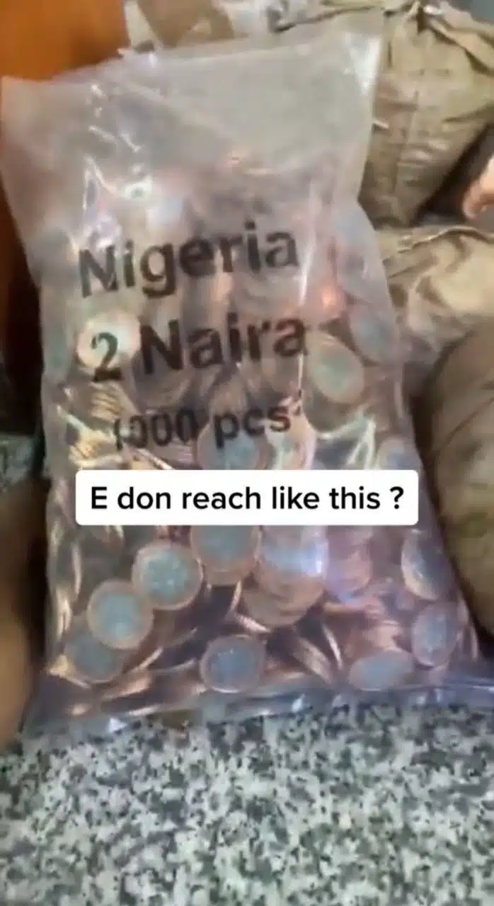 Customers lament as bank hands out coins amidst Naira notes scarcity (Video)