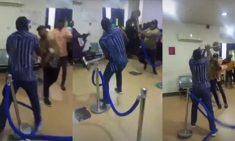 Two men allegedly fight dirty in bank over new Naira notes (Video)