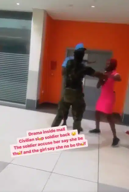 Lady lands back a slap on a soldier who first assaulted her 