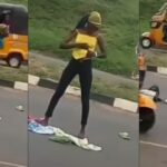 Lady runs mad after being dropped by an alleged yahoo boy in middle of a road