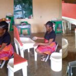 Teacher wash pupils' desks