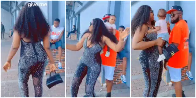 Wife causes buzz as she tries to form slay queen in public, husband quickly hands her their baby, she reacts