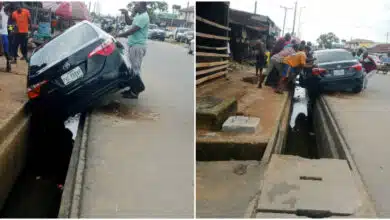 Moment car wash attendant narrowly escapes death after crashing customer's vehicle while test driving it in Port Harcourt