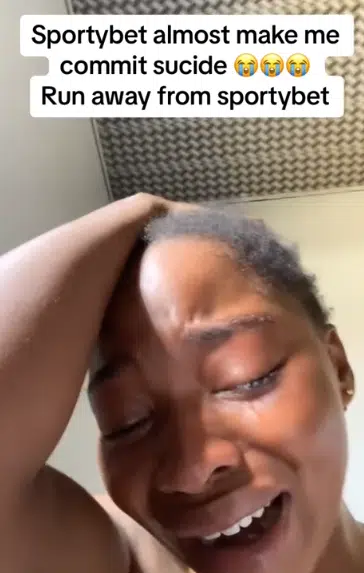 Nigerian lady cries her eyes out after losing all her savings to sports betting; Video causes buzz