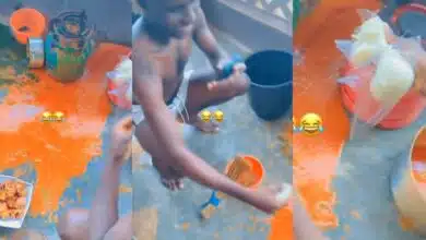 Hungry Nigerian man egusi soup floor wraps of fufu