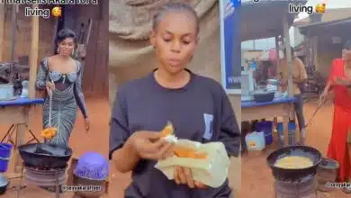 "One akara fit reach ₦500" - Netizens kick as a beautiful lady wears different outfits to sell akara at the roadside