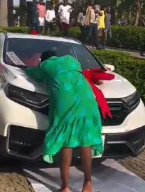 Lady overjoyed, runs barefoot at work as husband surprises her with car gift on birthday