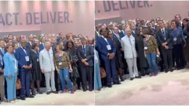 Moment Oyinbo woman tries to block President Tinubu during a group photograph with dignitaries at COPE28 summit