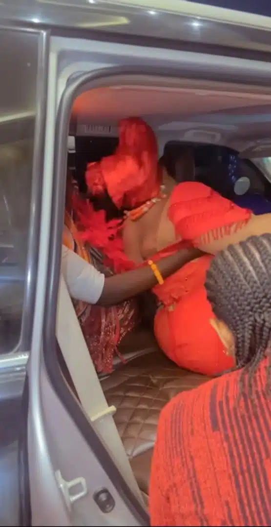 Moment Nkechi Blessing struggles to get into a car in a tight-fitted dress