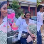 Lady blushes as boyfriend showers her with money and gifts on sign out day