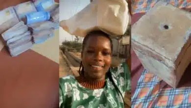 Nigerian lady stuns social media as she breaks open savings box, flaunts bundles of naira notes online