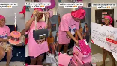 "I tap from it" - Beautiful lady sparks jealousy with ₦1m cheque, cake, shoes, bags gift from boyfriend on birthday