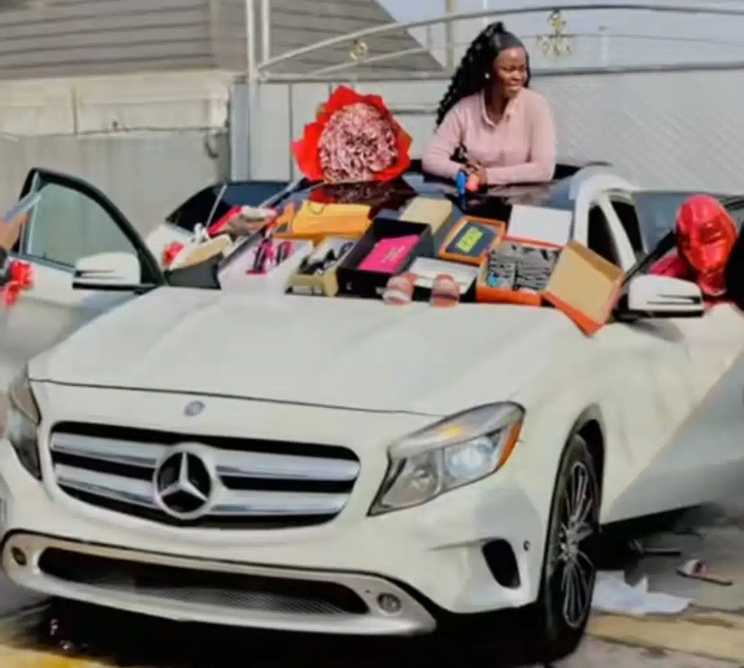 "Side chick favour me" - Beautiful side chick gets Mercedes-Benz, money bouquet, other gifts on New Year's Eve