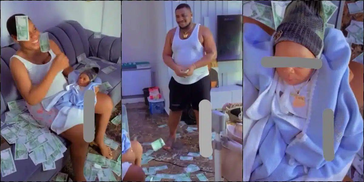 Happy father sprays wife and newborn baby with money