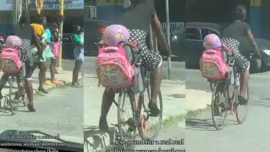 Jamaican supermom raises eyebrows online as she takes daughter to school on a bicycle while wearing high heels