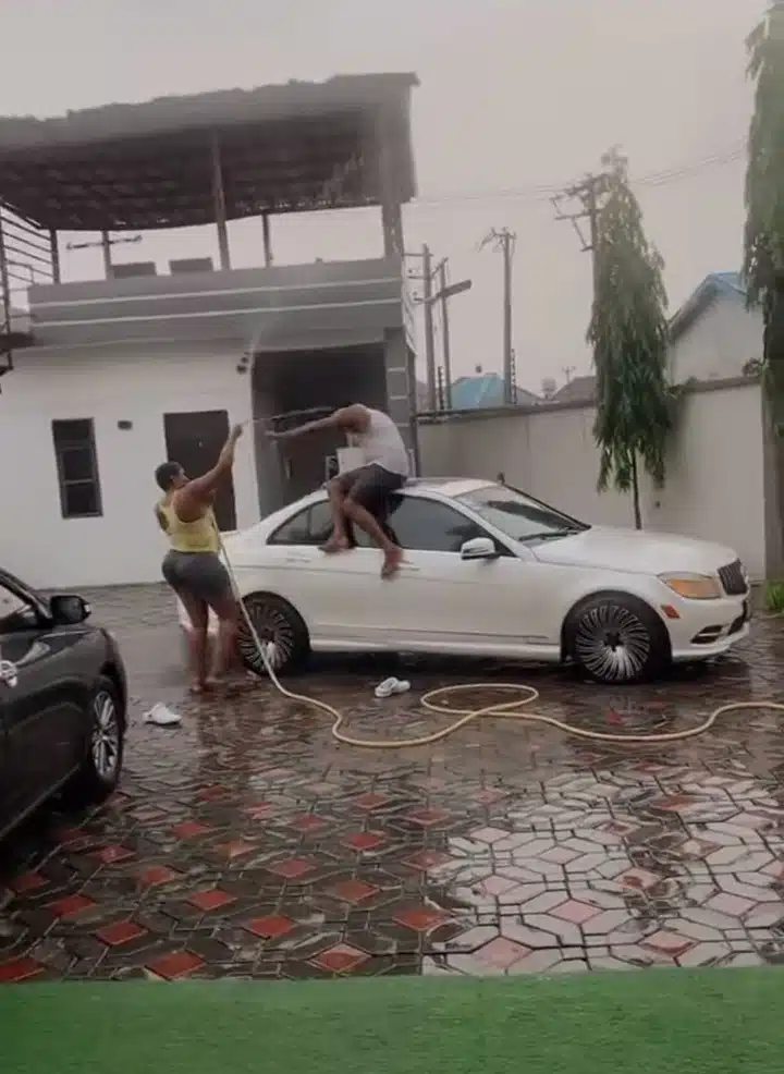 Little girl parents playing rain