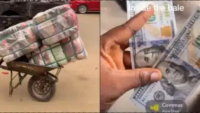 Okrika seller overjoyed as she finds $200 in bale of clothes