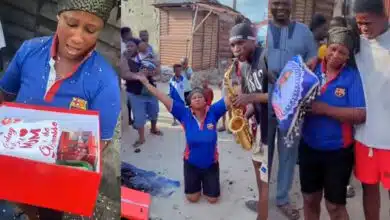 Nigerian charcoal-selling mother overwhelmed with emotion as son surprises her with gifts on birthday