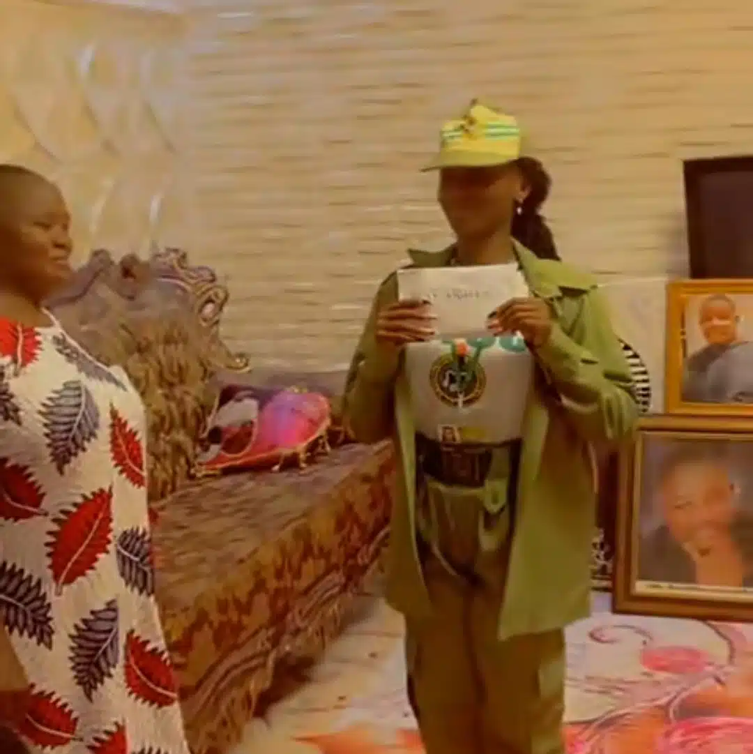 Youth corps member presents first NYSC allowance of ₦33,000 to her parents, salutes them