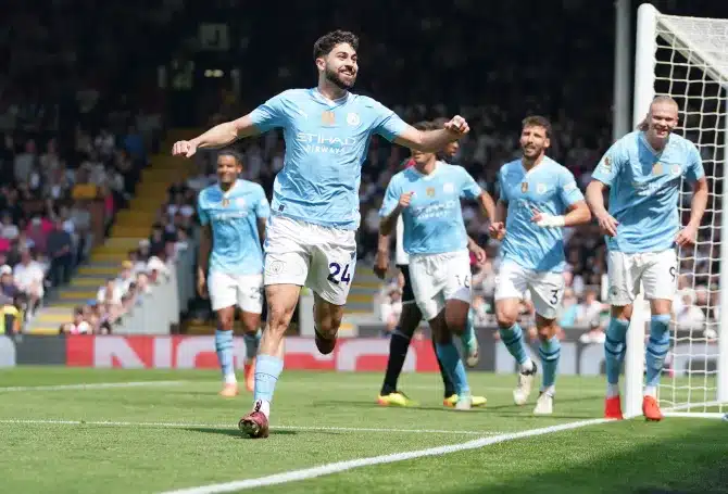 Manchester City cruise past Fulham 4-0 to pile pressure on Arsenal