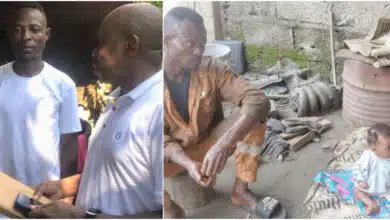 Mechanic who takes little baby to workshop after wife abandoned them receives N285k donations from Nigerians