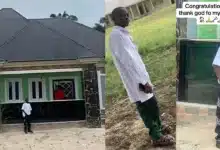 Young boy raises eyebrows as he celebrates building his house