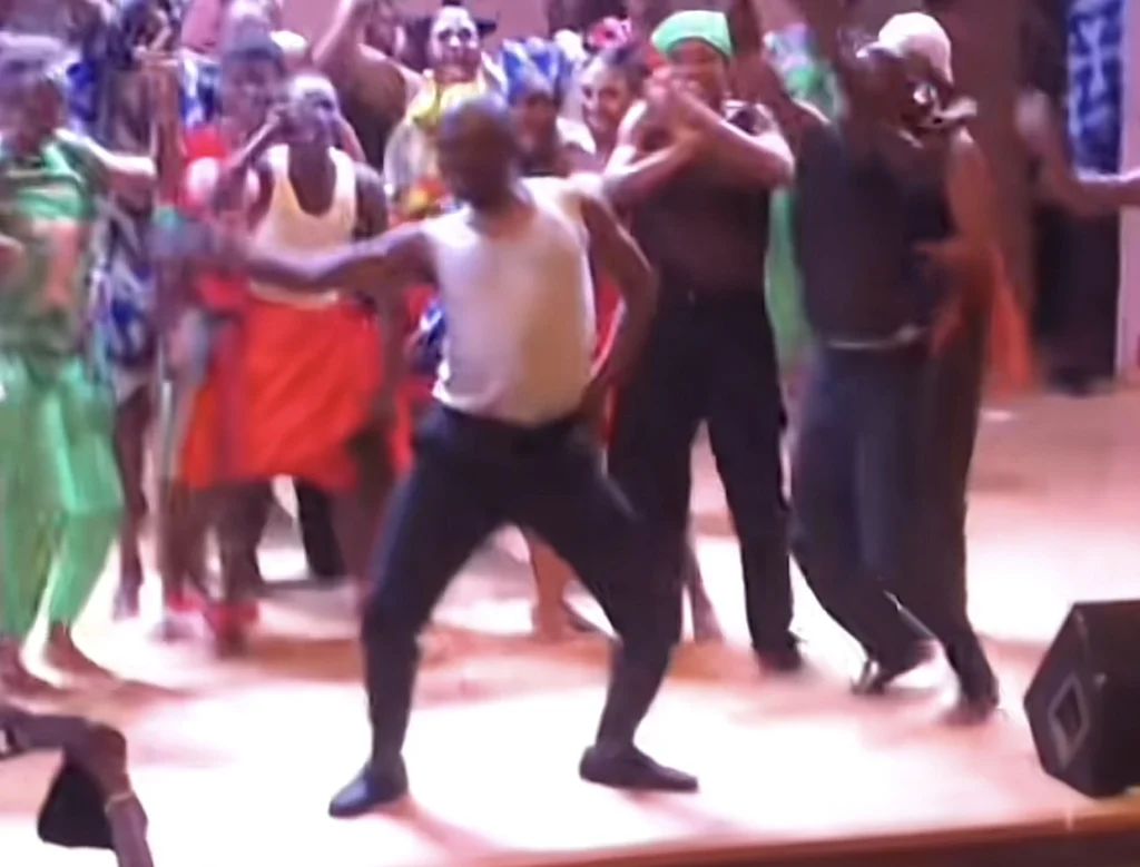 Students hail their jovial lecturer for dancing during a class presentation