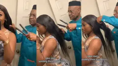 Emotional moment father helps his daughter stretch her hair