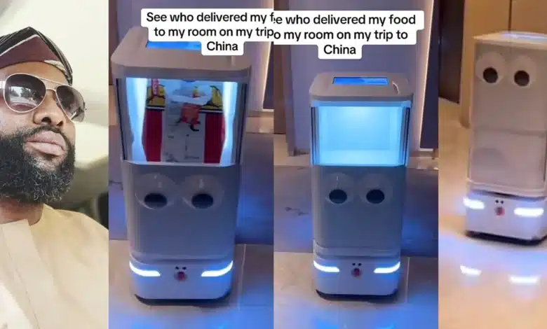 Man awed as robot delivers his food to his hotel in China