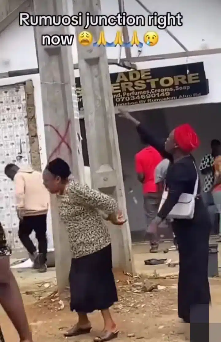 Christian women praying fire building 