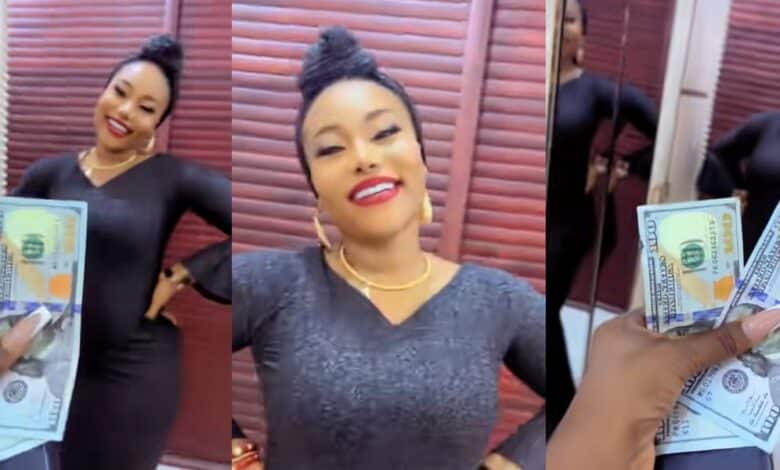 Nigerian lady excitedly flaunts 0 sallah gift from wealthy friend in viral video