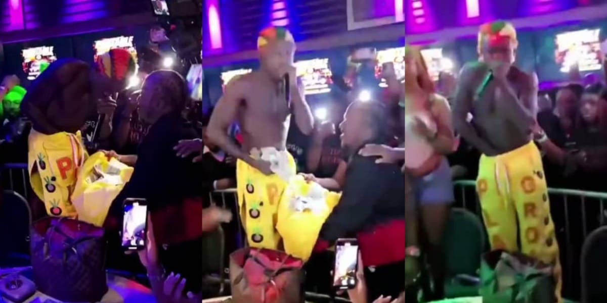 Video emerges of Portable stacking dollars sprayed on him at show in America in his trousers