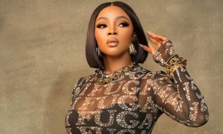 Toke Makinwa clashes with netizen over her stance on tribal marks