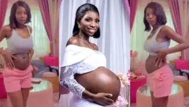 Lady shows off her stomach one month after giving birth to triplets via C-section