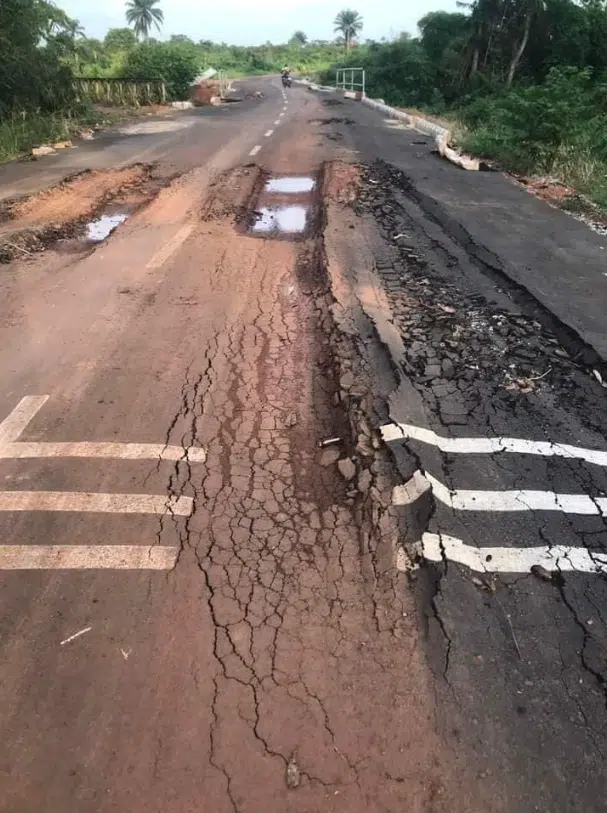 Shock as road commissioned recently by Senator Orji Uzor Kalu washed away by rain after few months